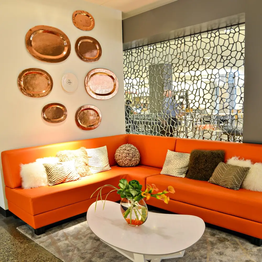 Cozy welcome room featuring a comfortable couch and a stylish coffee table, perfect for relaxation and gatherings.