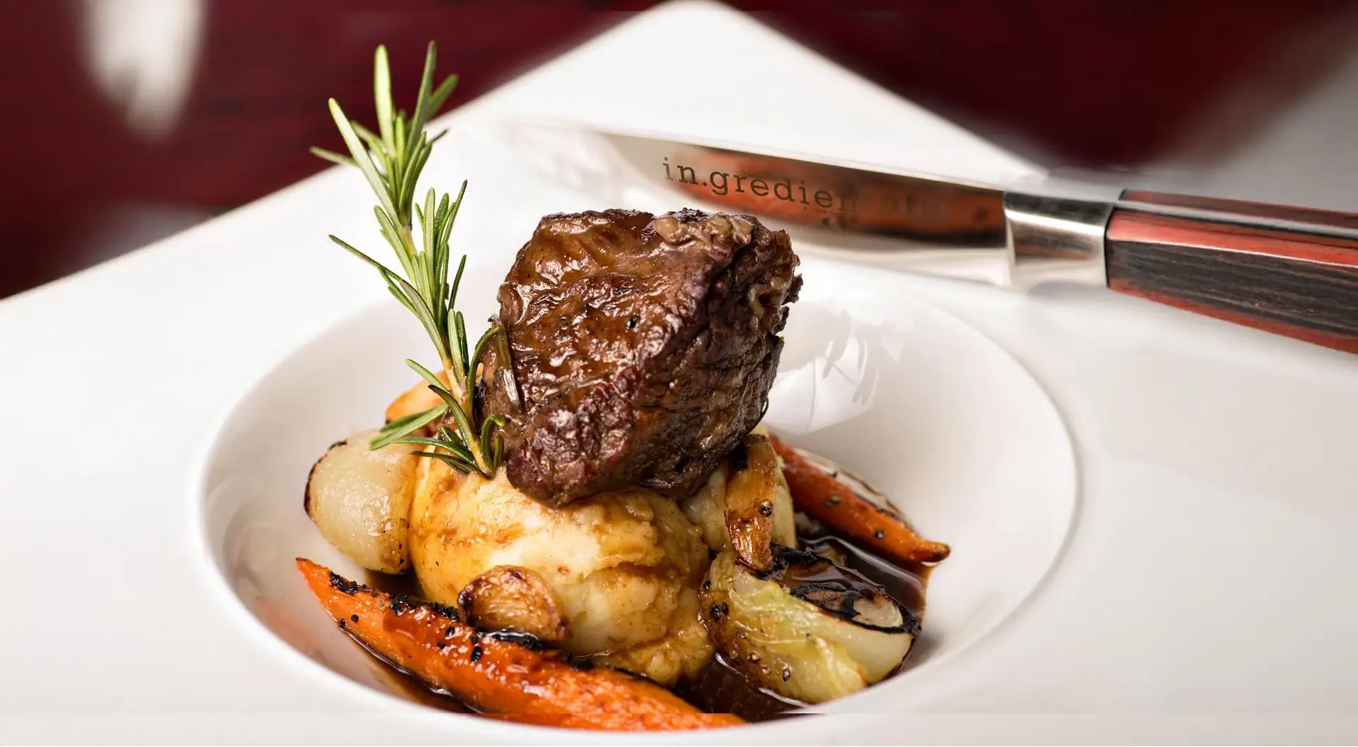 A plate of delicious food set with a knife and fork, inviting the viewer to enjoy a meal.